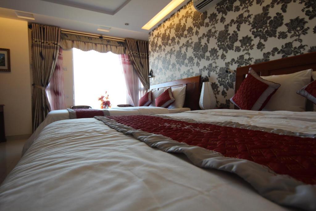Trung Duong Da Nang Beach Hotel Quarto foto