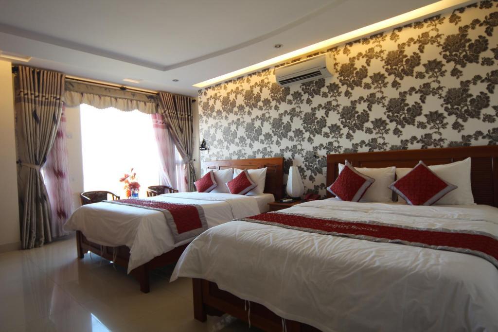 Trung Duong Da Nang Beach Hotel Quarto foto