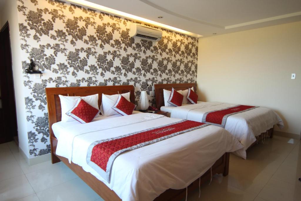 Trung Duong Da Nang Beach Hotel Quarto foto